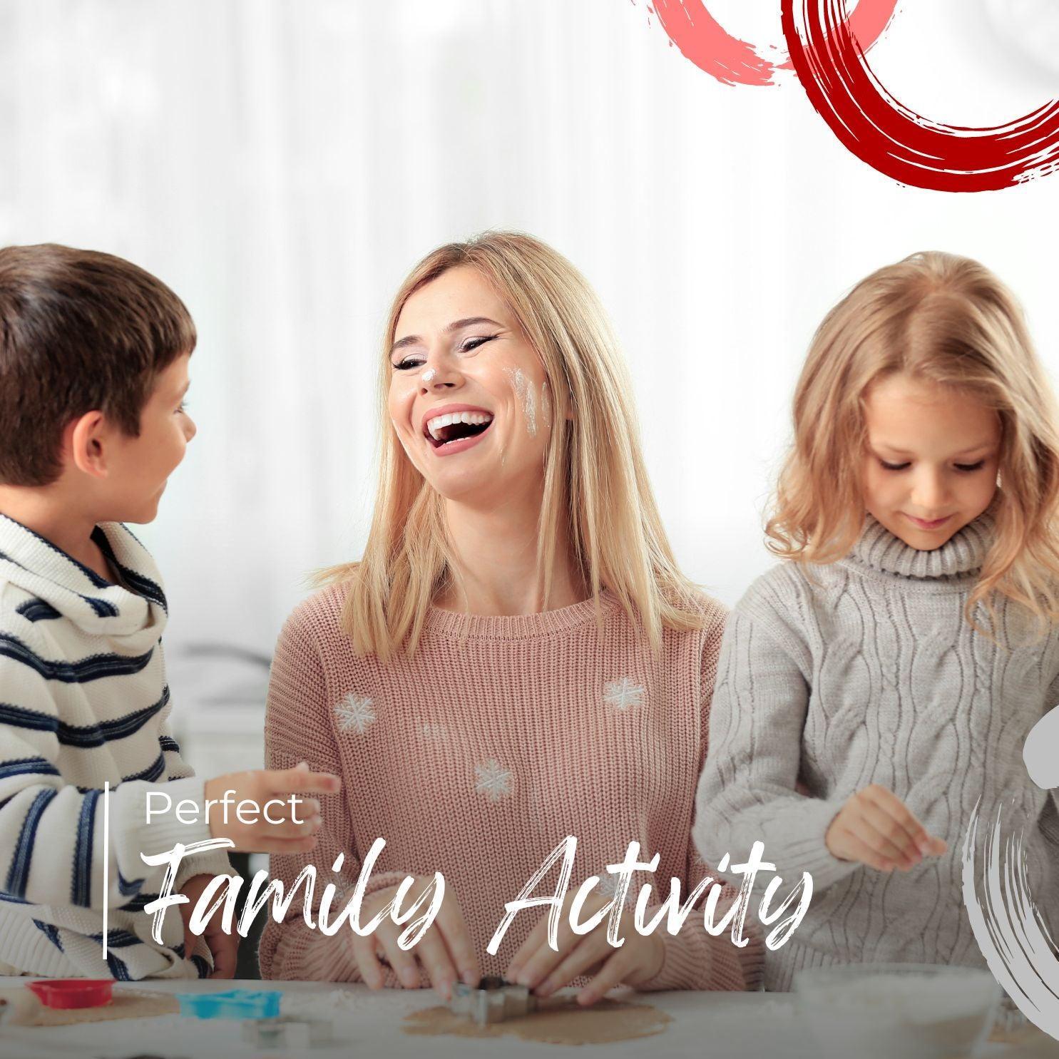 Mother and two children enjoying baking cookies together indoors family activity