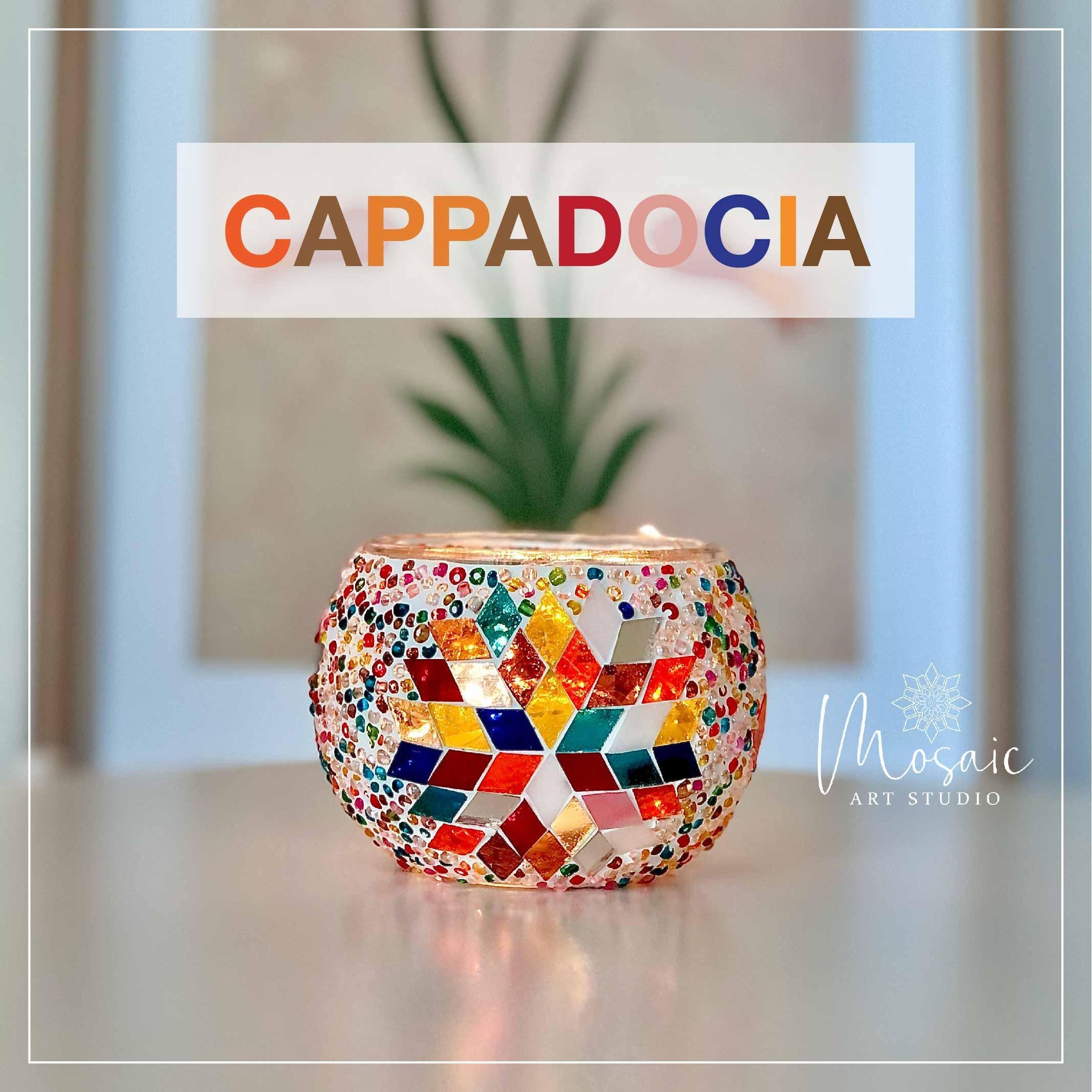 Colorful mosaic candle holder with geometric star design on white surface